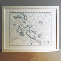 Bahamas wall art.  Hand-drawn letterpress printed map of the Bahamas in dark grey ink on archival grade cotton paper.  Shorelines are accented with hand-painted watercolor wash.