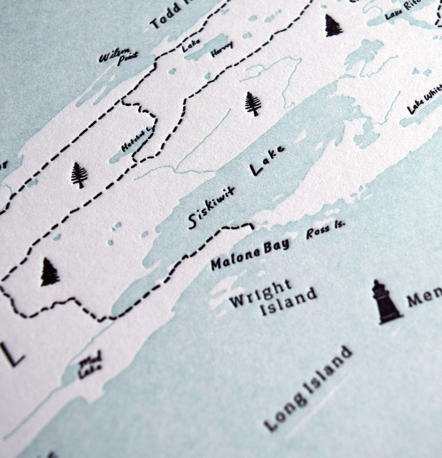 Hand drawn letterpress printed map of Isle Royale with prominent landmarks identified.