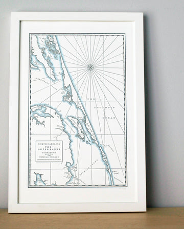 Outerbanks Map.  Letterpress printed wall art print framed in white depicting the North Carolina Coast of the United States from Currituck sound to wimble shoals