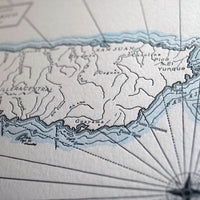Fine art print of Puerto Rico Island in the Caribbean Sea. Detailing natural features including streams peaks points and bays. Shorelines are accented with hand watercolor wash