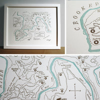 Framed artistic trail map of smith rock state park oregon.  includes prominent rock features, hiking trails, and the crooked river.  Hand-drawn letterpress printed 