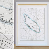 Framed map of Aruba in the Caribbean Sea.  Letterpress print with watercolor wash along shorelines.