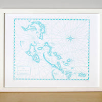 Letterpress art print.  Framed map of bahamas Islands hand-printed on letterpress with hand-painted watercolor along shorelines.