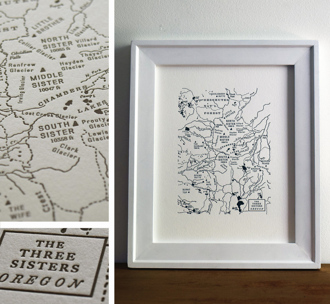Framed map of the Three sisters area of oregon.  Deschutes national forest map including three sisters peaks and prominent water shed drainanges and trails identifiied printed in one color