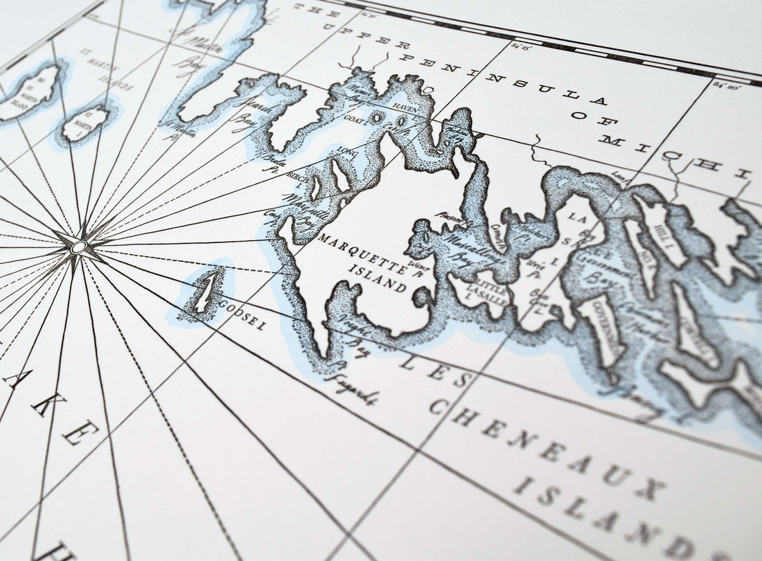 Hand-drawn map of Lake Huron including Les Cheneaux Islands Mackinac Island upper Peninsula Michigan.  Printed in letterpress with watercolor wash along shorelines