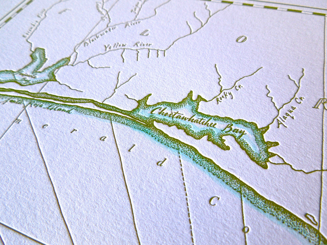 Norhwest florida coast map letterpress printed with watercolor accent along shorelines