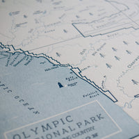 Pacific Northwest art map including the coastline along Olympic National Park Identifies promient beaches rivers and trails as well as mountain aspects