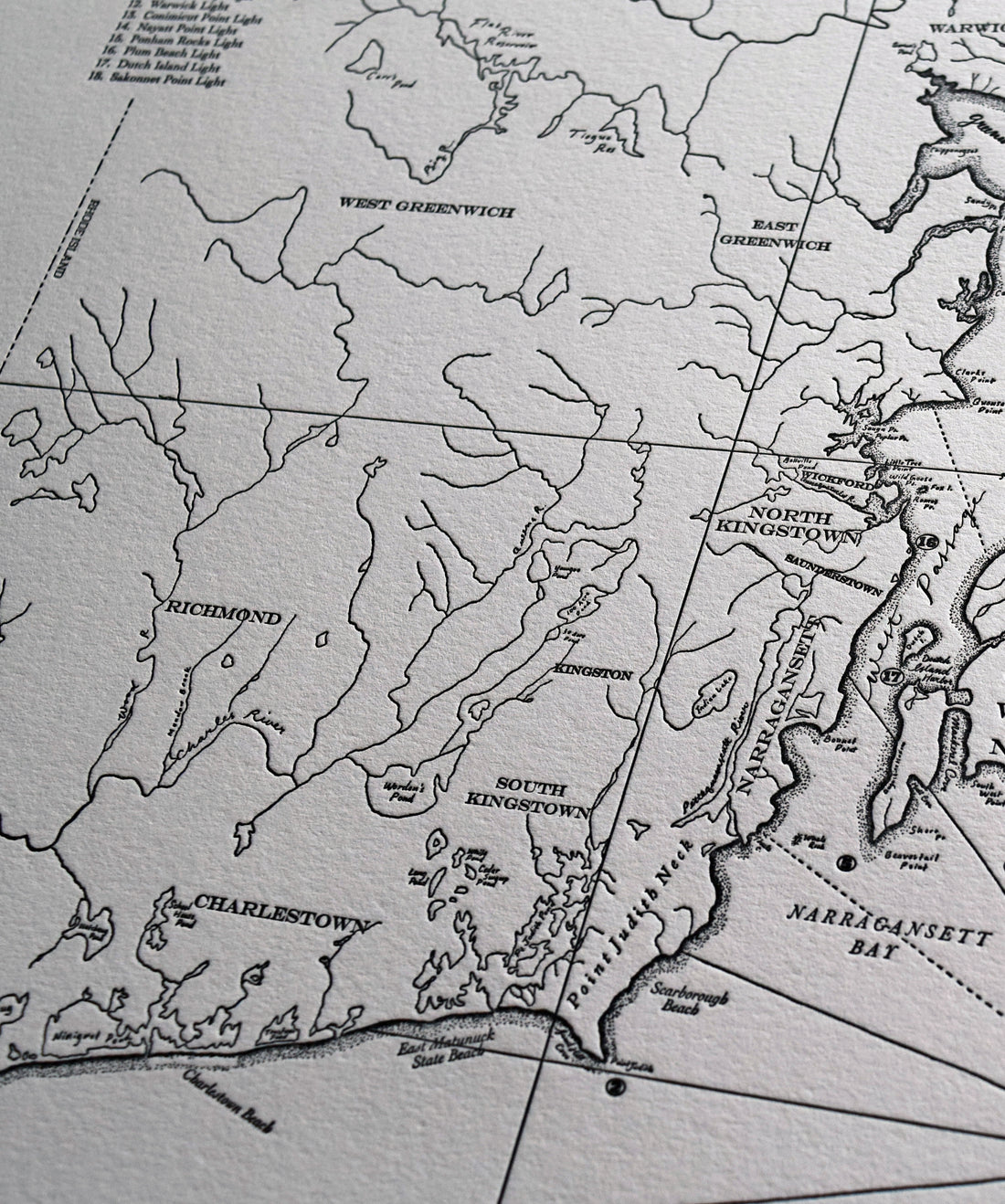 Fine art wall print map of the Rhode Island Seashore identifying lighthouses and prominent natural freatures including creeks lakes and shorelines