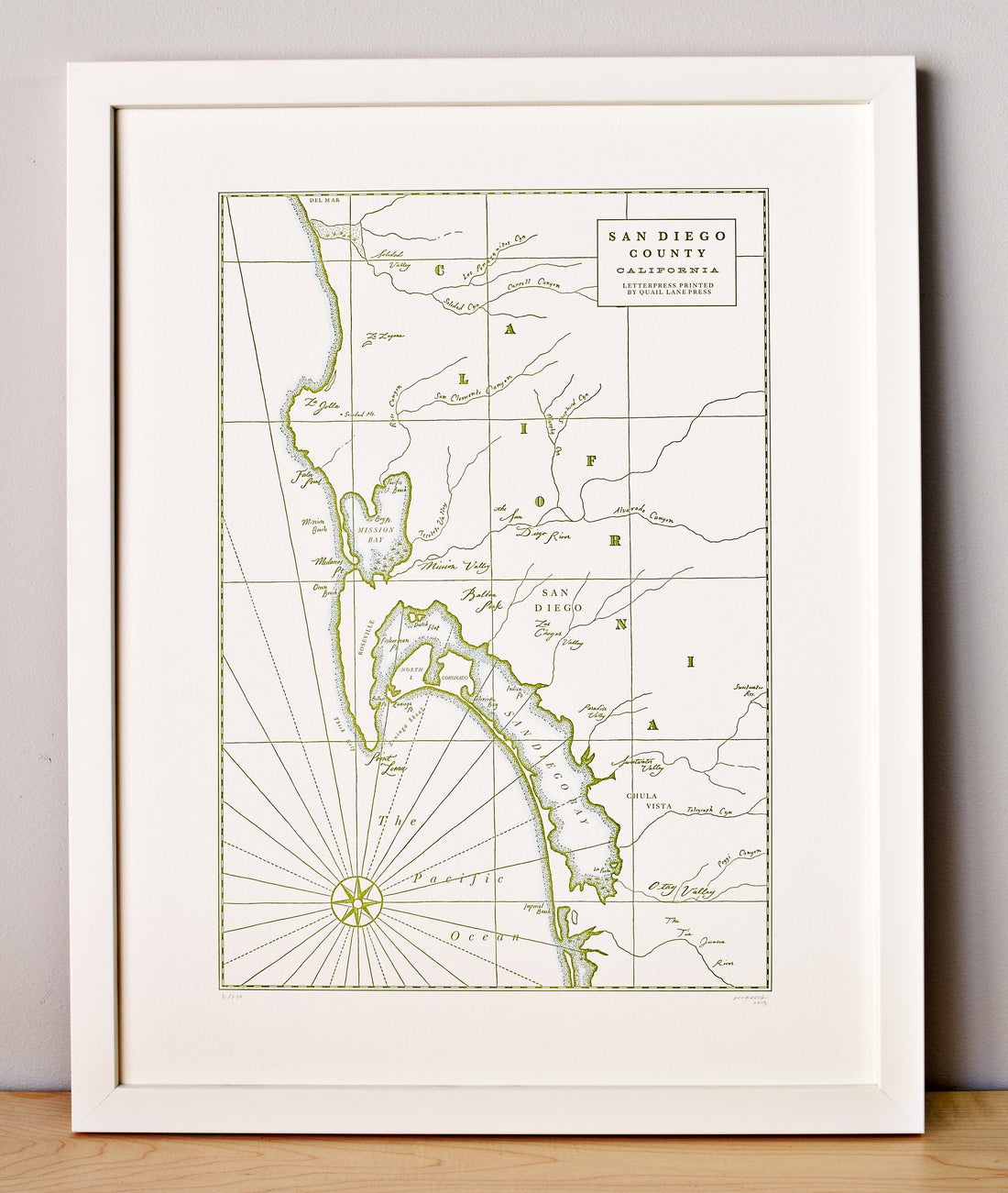 Map of the San Diego County Coast including prominent landmarks and shoreline features includes hand painted watercolor accent wash along the coastlines 