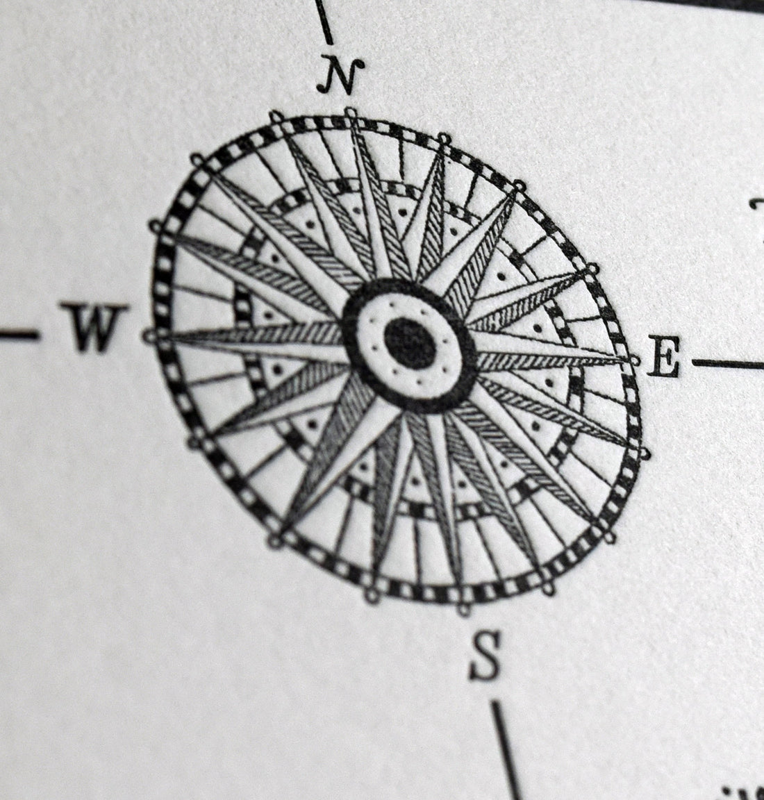 Letterpress printed map of the san juan islands and salish sea in nautical artistic theme including detailed illustrations of prominent features and compass rose printed on letterpress by local pacific norhwest artist