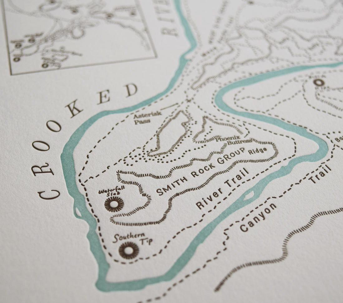 Map of smith rock state park near Bend Oregon an attraction known for attracting rock climbers hikers and nature entusiasts.  Letterpress printed artistic map depicting trails peaks and river