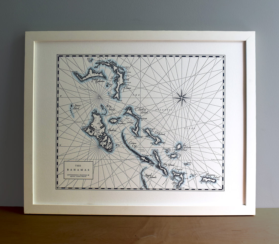 Framed wall art map of bahamas letterpress printed.  Intricate detailing of the bahamas islands with watercolor accent along shorelines