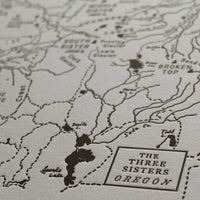 Artistic map depicting the three sisters wilderness.  Hand drawn and letterpress printed map of the wilderness area local to Bend oregon.  Identifies mountains, lakes, trails, and creeks